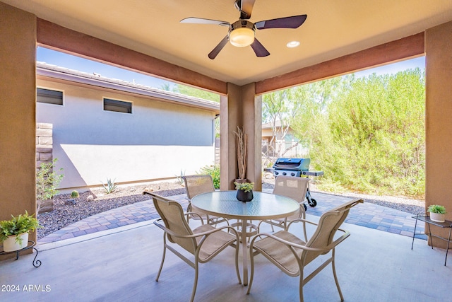 view of patio / terrace featuring ceiling fan