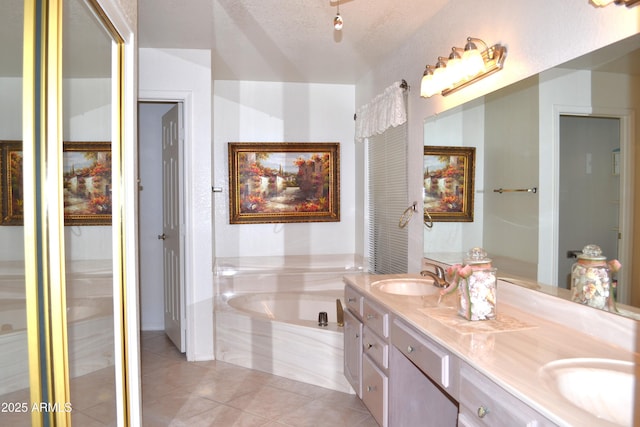 9130 W Utopia Rd, Peoria, AZ 85382 - bathroom featuring double vanity, a garden tub, and tile patterned floors
