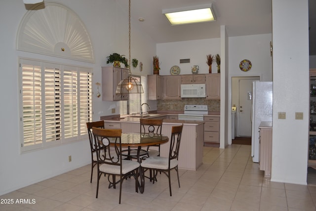 9130 W Utopia Rd, Peoria, AZ 85382 - dining area with high vaulted ceiling and light tile patterned floors