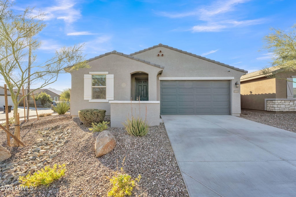 view of front of property with a garage