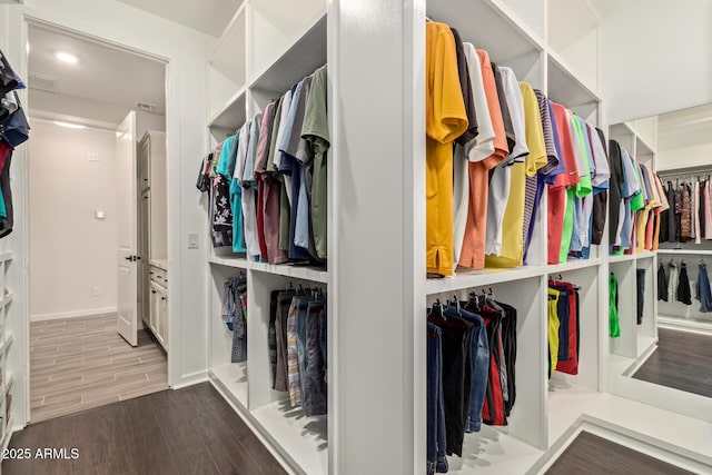 spacious closet featuring visible vents and wood tiled floor