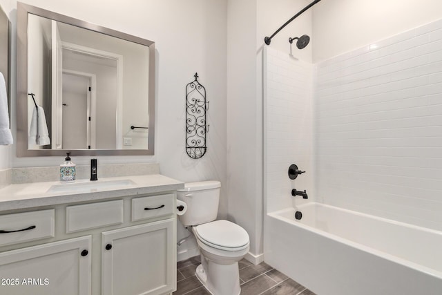 bathroom featuring toilet, shower / bathtub combination, wood tiled floor, and vanity