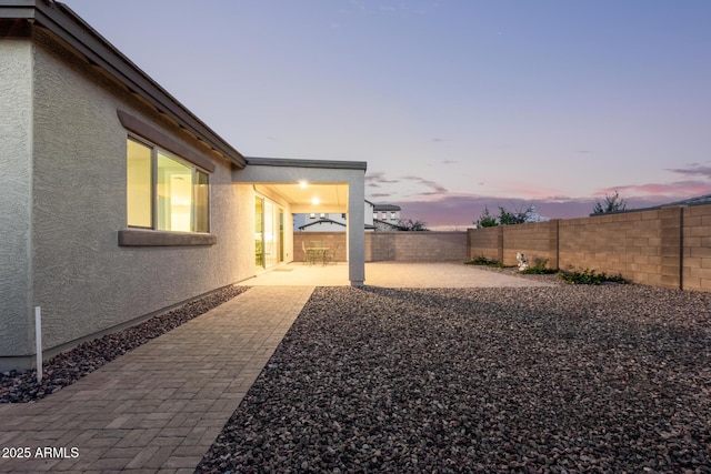 view of yard with a patio area and a fenced backyard