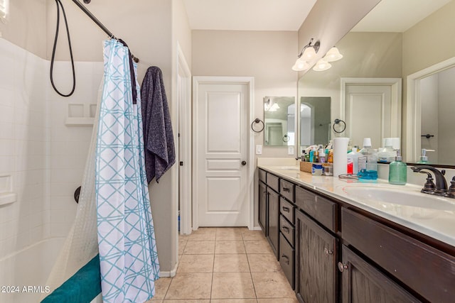 bathroom with vanity and tile patterned floors