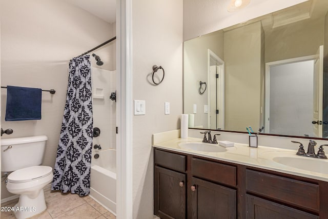 full bathroom with shower / bath combination with curtain, tile patterned floors, toilet, and vanity