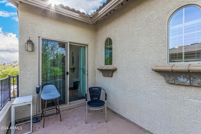 view of patio with a balcony