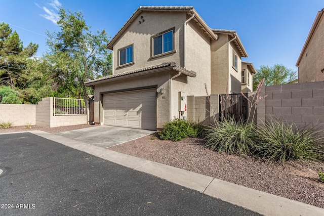 view of front of home with a garage