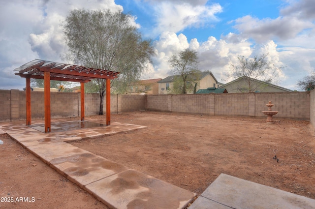 view of yard with a patio area, a fenced backyard, and a pergola