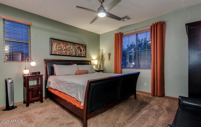 bedroom featuring ceiling fan and carpet flooring