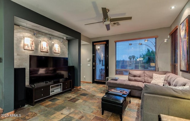 living room with ceiling fan