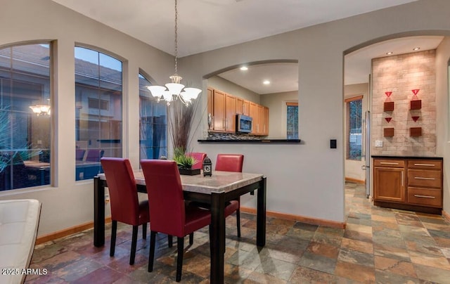 dining room with an inviting chandelier