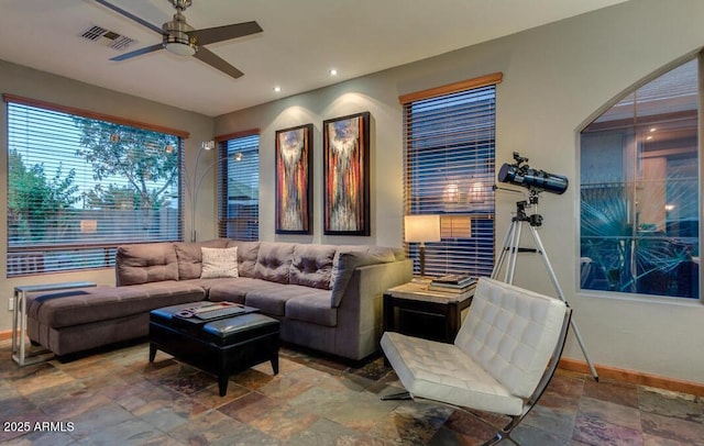 living room featuring ceiling fan