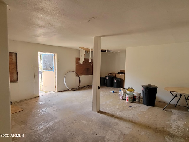 interior space featuring a textured ceiling