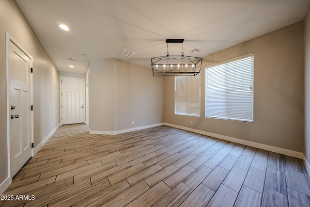 10036 E Naranja Ave, Mesa, AZ 85209 - unfurnished room with light wood-style flooring and recessed lighting