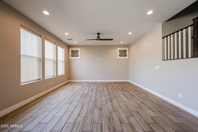 10036 E Naranja Ave, Mesa, AZ 85209 - empty room featuring ceiling fan, light wood-style floors, and recessed lighting
