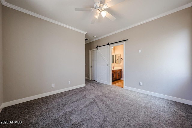 10036 E Naranja Ave, Mesa, AZ 85209 - unfurnished bedroom with light colored carpet, ornamental molding, a barn door, ensuite bath, and ceiling fan