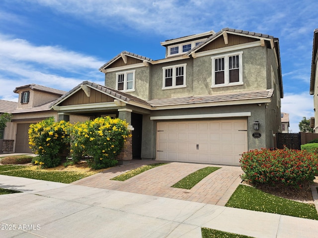 10036 E Naranja Ave, Mesa, AZ 85209 - craftsman-style home with decorative driveway, stucco siding, an attached garage, and a tiled roof