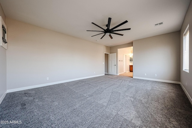 10036 E Naranja Ave, Mesa, AZ 85209 - carpeted empty room featuring a ceiling fan and baseboards