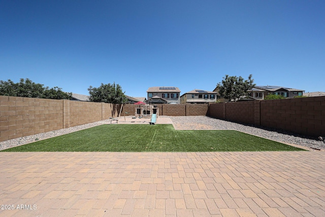 10036 E Naranja Ave, Mesa, AZ 85209 - fenced backyard featuring a patio area