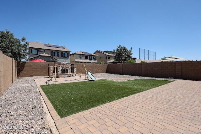 10036 E Naranja Ave, Mesa, AZ 85209 - fenced backyard with a patio area, a playground, and a residential view