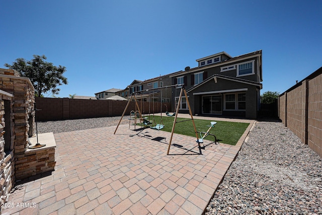 10036 E Naranja Ave, Mesa, AZ 85209 - fenced backyard with a playground and a patio area