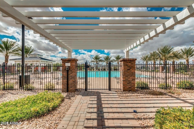 10036 E Naranja Ave, Mesa, AZ 85209 - view of patio / terrace with a pergola and a community pool