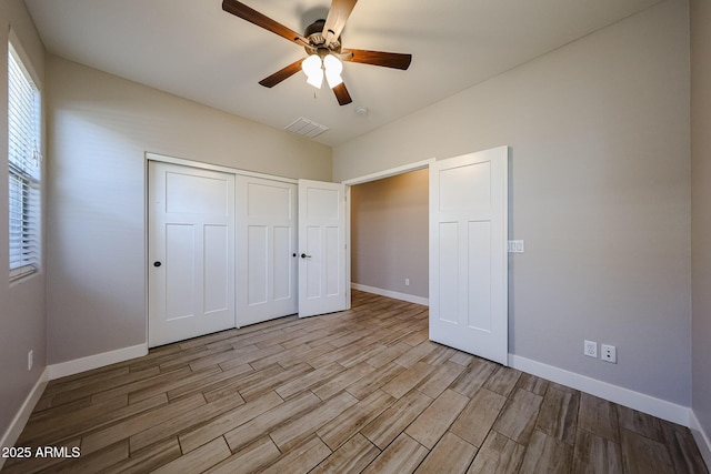 10036 E Naranja Ave, Mesa, AZ 85209 - unfurnished bedroom featuring light wood finished floors, a closet, a ceiling fan, and lofted ceiling