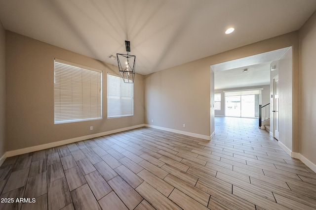 10036 E Naranja Ave, Mesa, AZ 85209 - spare room with wood tiled floors, a chandelier, and recessed lighting