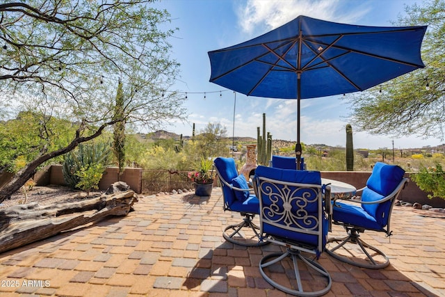 view of patio / terrace with fence