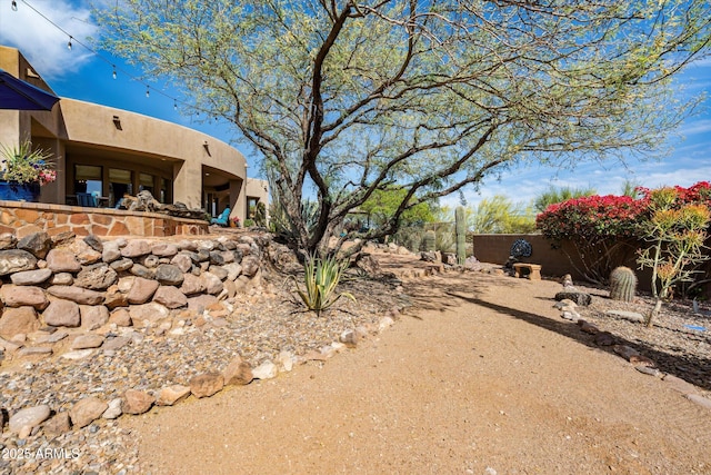 view of yard featuring fence