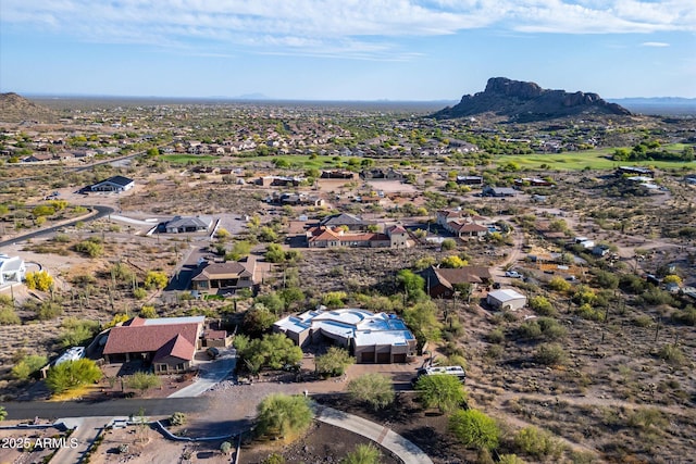 aerial perspective of suburban area featuring a mountain backdrop