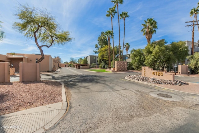 view of street featuring curbs