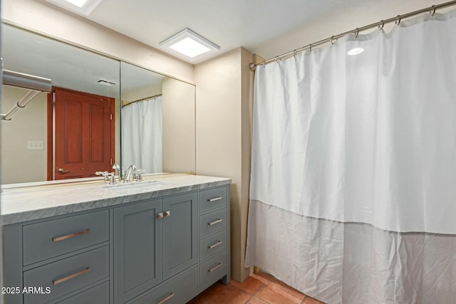 bathroom featuring vanity and tile patterned floors