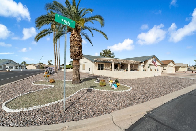 ranch-style house with a residential view and stucco siding