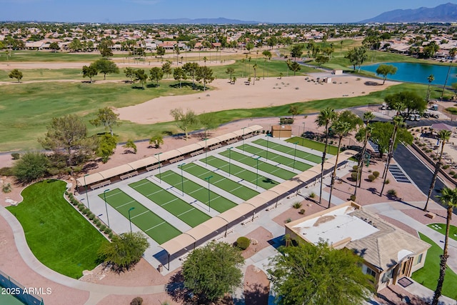 bird's eye view with a residential view, a water and mountain view, and view of golf course