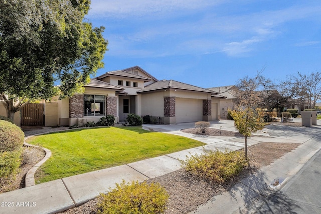 prairie-style house with a garage and a front yard