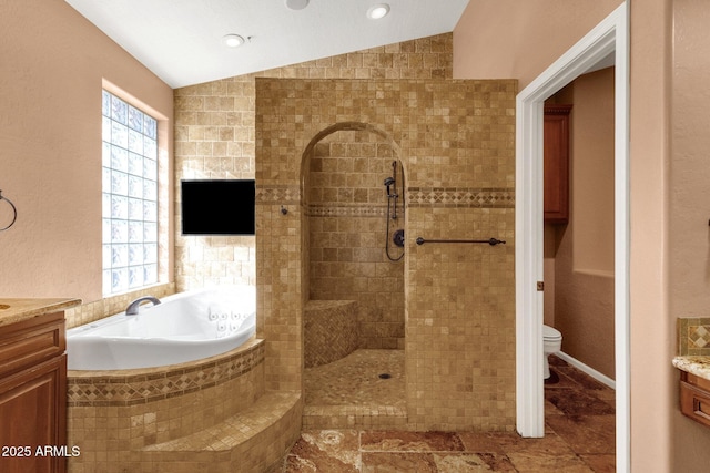 full bathroom featuring vanity, tile patterned floors, lofted ceiling, and toilet