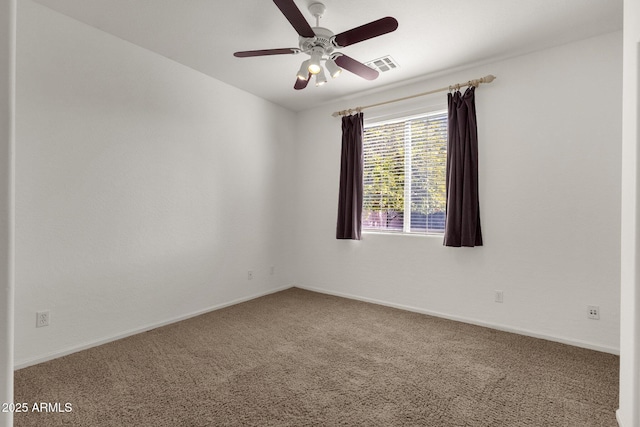 carpeted empty room with ceiling fan