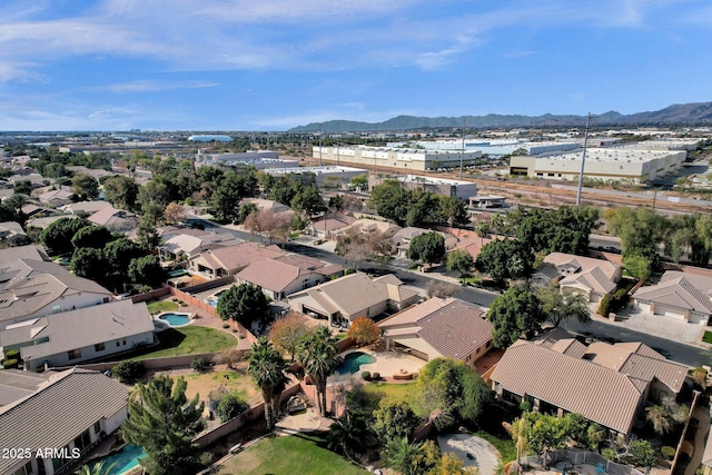 birds eye view of property featuring a mountain view