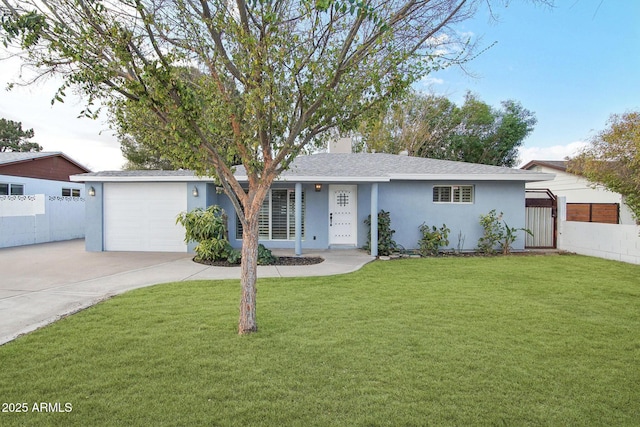 ranch-style house featuring concrete driveway, stucco siding, an attached garage, fence, and a front yard