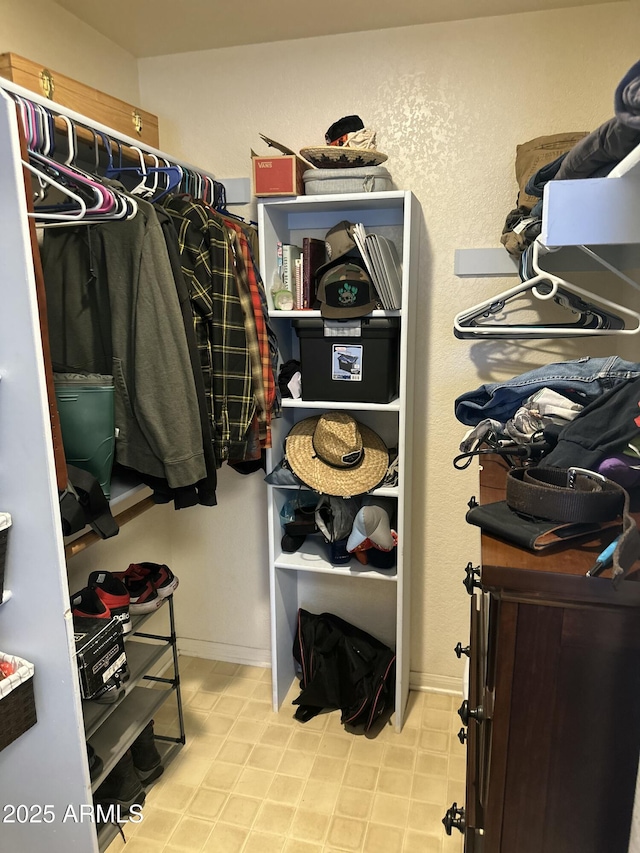 spacious closet with light floors