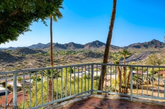 balcony featuring a mountain view