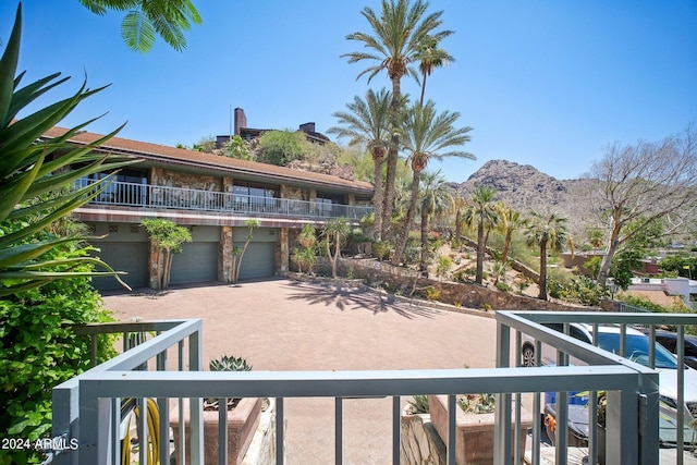 balcony featuring a mountain view