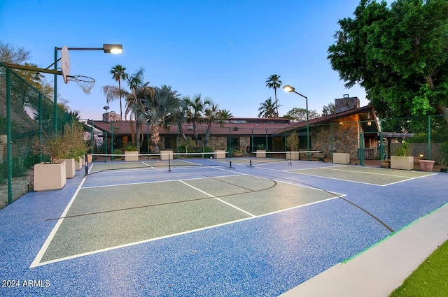 view of tennis court with basketball court