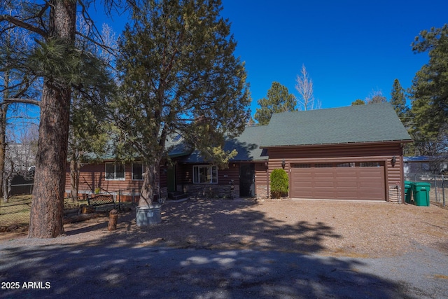 cabin featuring a garage