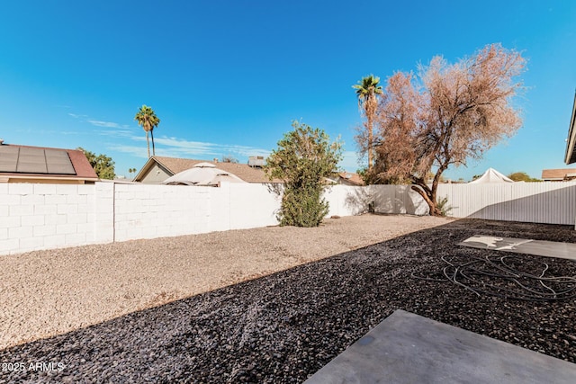 view of yard featuring a fenced backyard