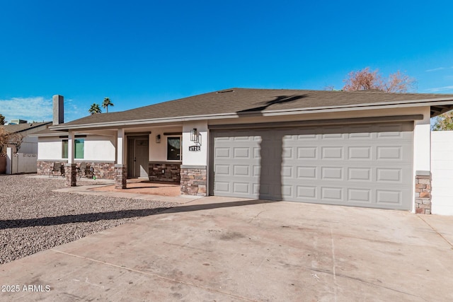 ranch-style house with an attached garage, stone siding, concrete driveway, and stucco siding