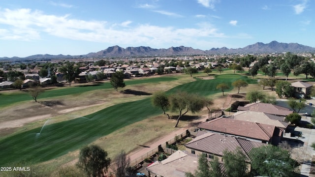 exterior space featuring a mountain view, a residential view, and view of golf course