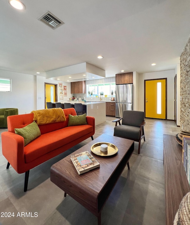 living room featuring plenty of natural light