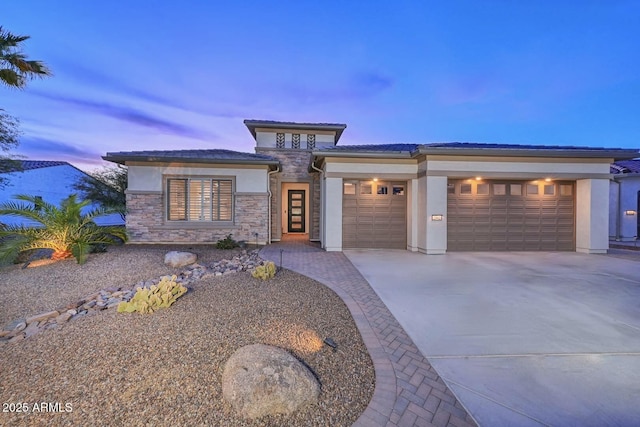 prairie-style home with a garage